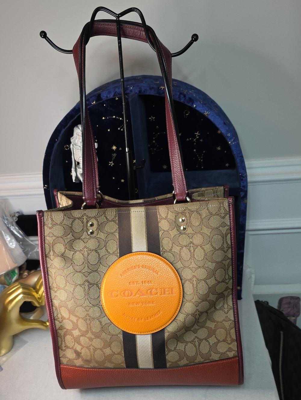 Coach Dempsey Signature Tote with Orange Medallion and Burgundy Trim